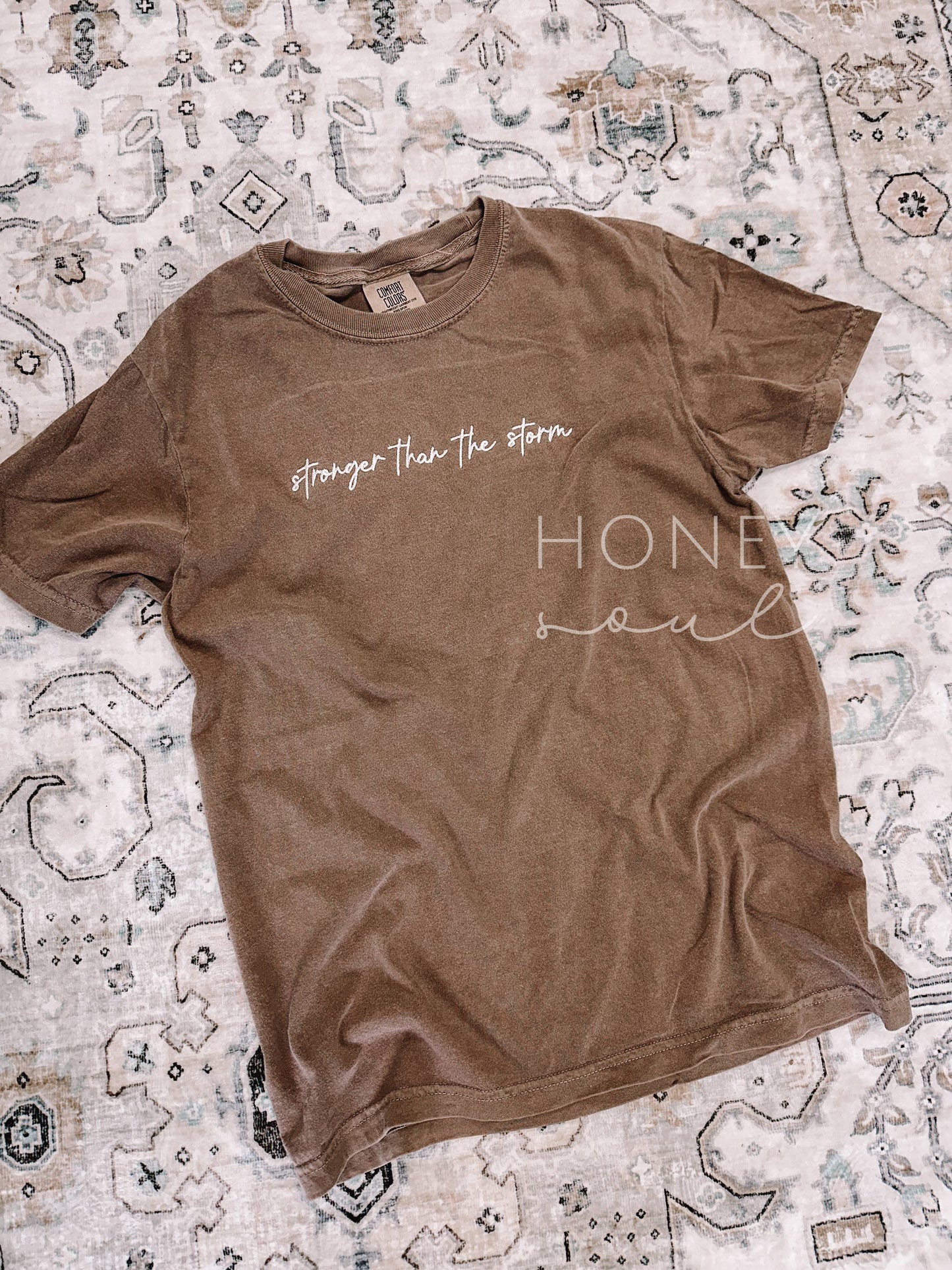 Embroidered Stronger Than The Storm Tee Espresso