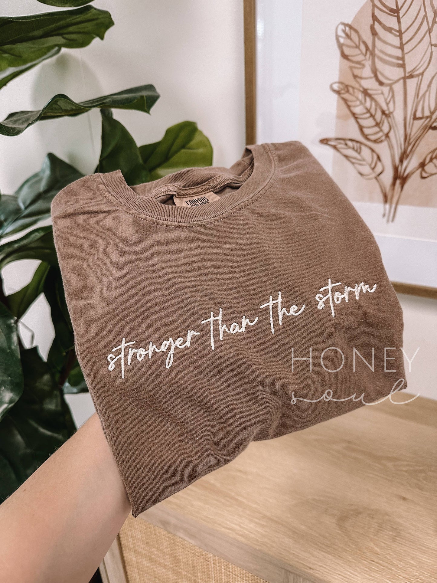 Embroidered Stronger Than The Storm Tee Espresso