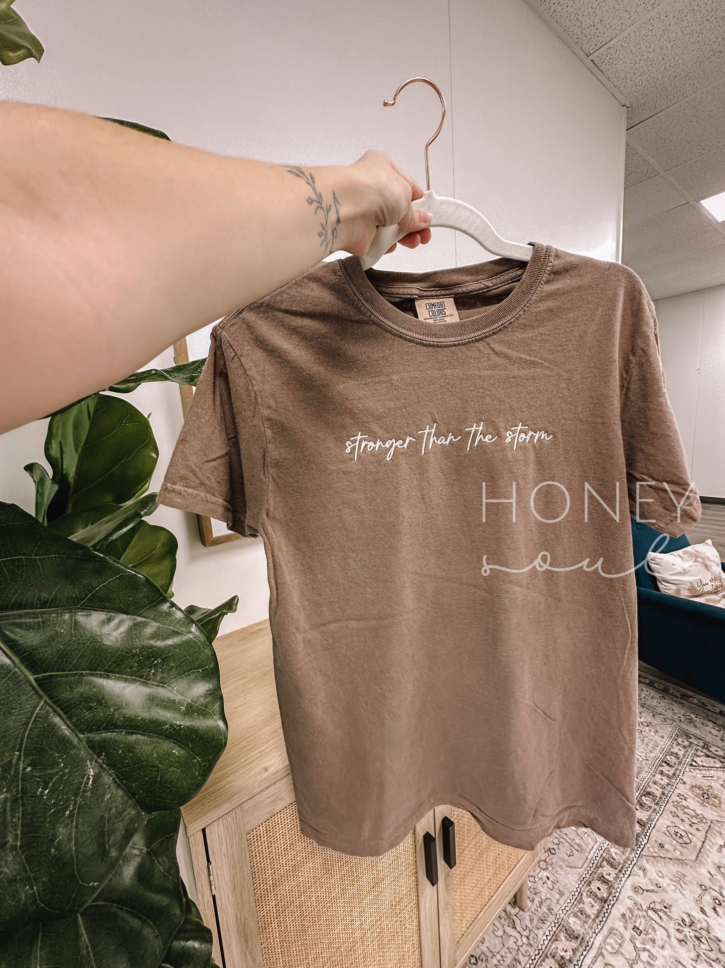 Embroidered Stronger Than The Storm Tee Espresso