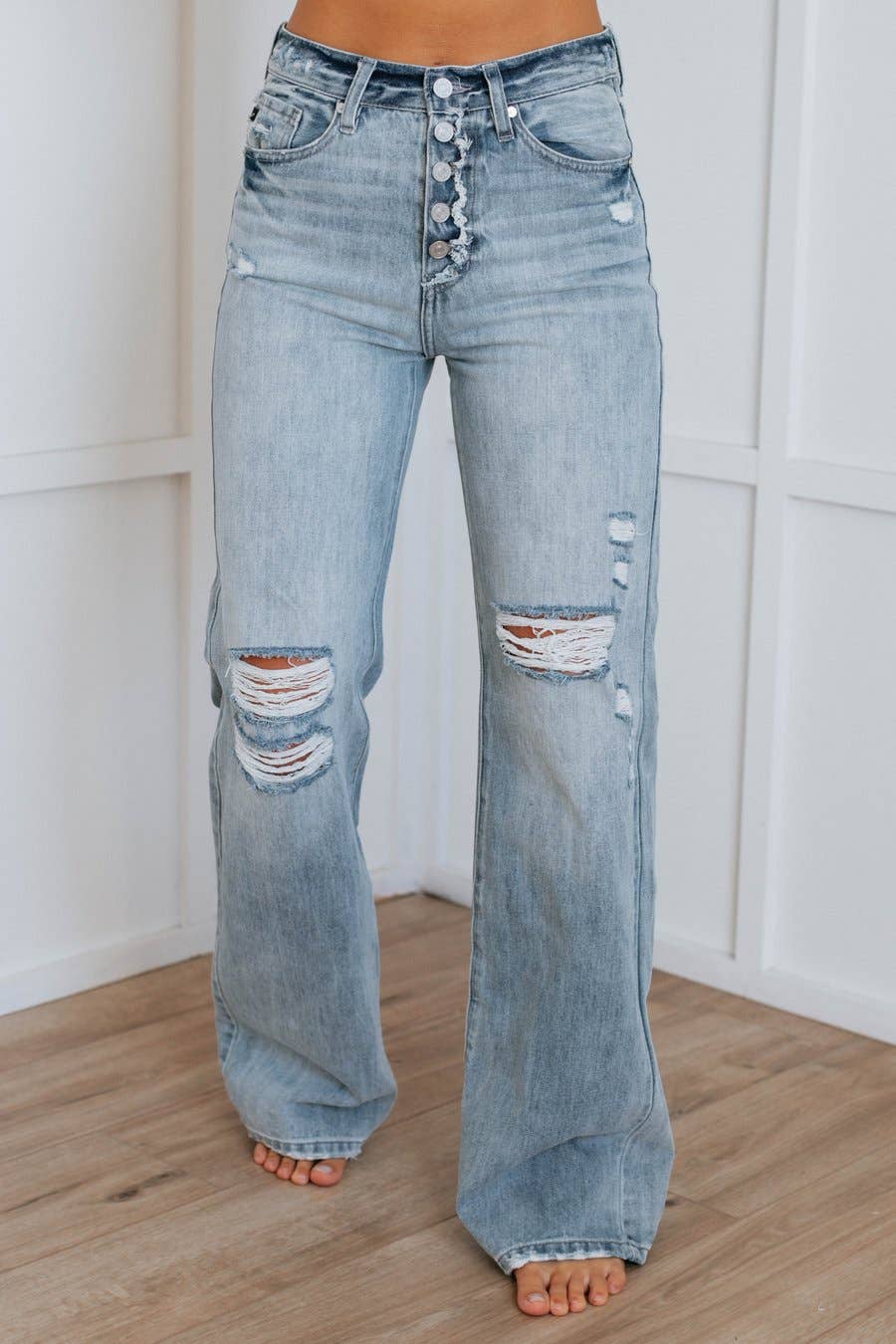 Light Denim straight leg mid waist ripped jeans